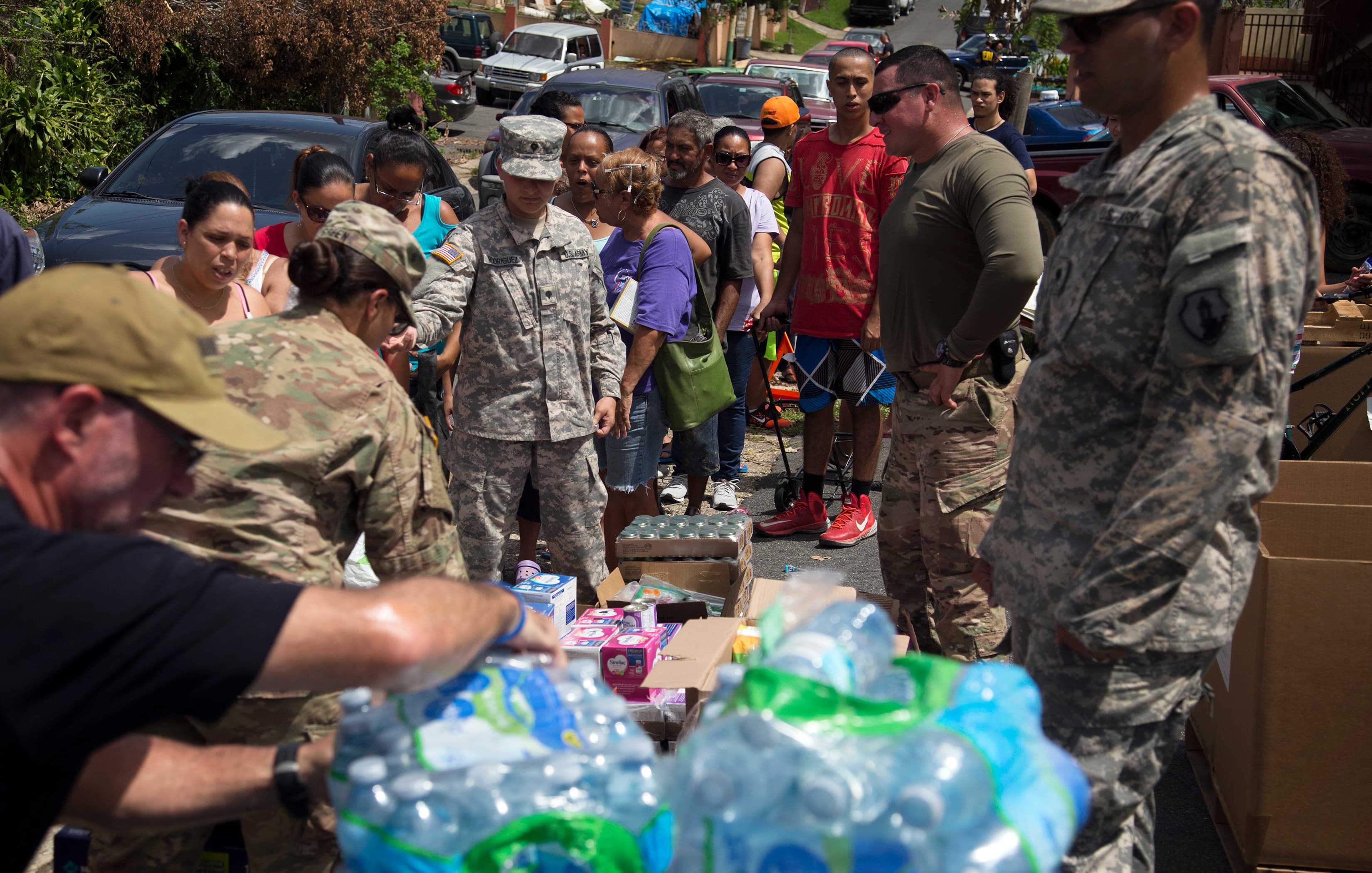 U.S. Army reservists distributing food, water, and baby products to Hurricane Maria survivors in Toa Baja, Puerto Rico